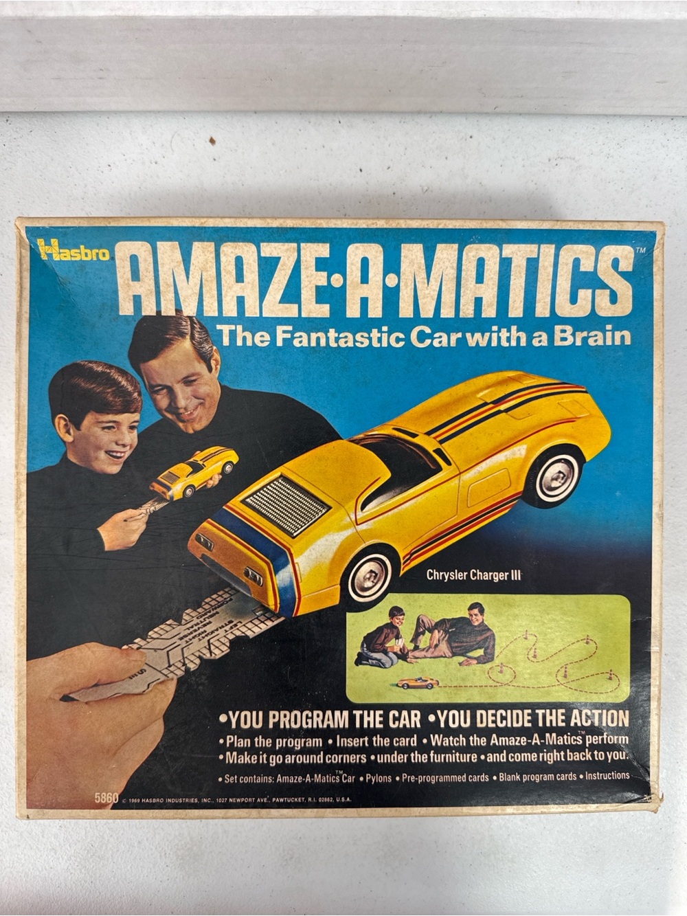 Hasbro Amaze-A-Matics Yellow and Black Chrysler Charger III Toy Car Box Art